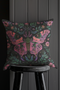 A beautifully detailed pillowcase cover featuring a vibrant moth in shades of pink, purple, and green. The moth is framed by intricate floral designs, including lush green leaves and pink flowers, all set against a dark, moody background. The design evokes a cottagecore aesthetic with gothic undertones, blending nature with a magical, whimsical vibe.